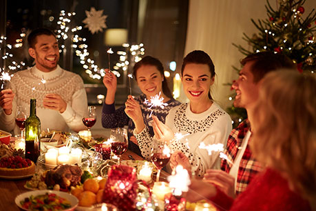 Family gathered around the table for Christmas dinner